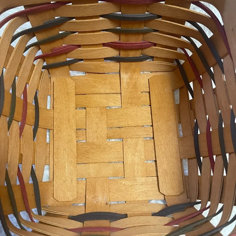 Longaberger 1995 set of two Handcrafted round and Square Woven baskets .